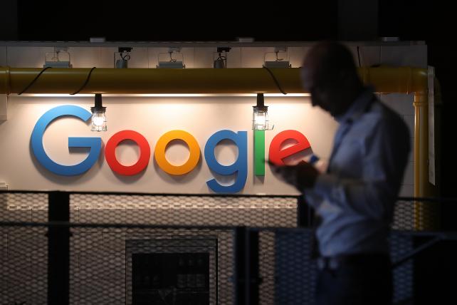 Alphabet soars to record after earnings wallop estimates