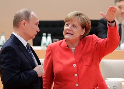 Cossacks and Flowers as Putin Dances at Austrian Minister's Wedding