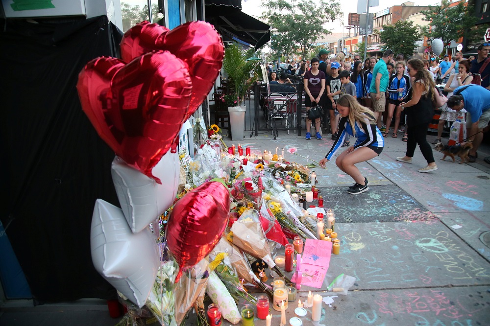 Toronto gunman a puzzle to his own tight-knit immigrant community